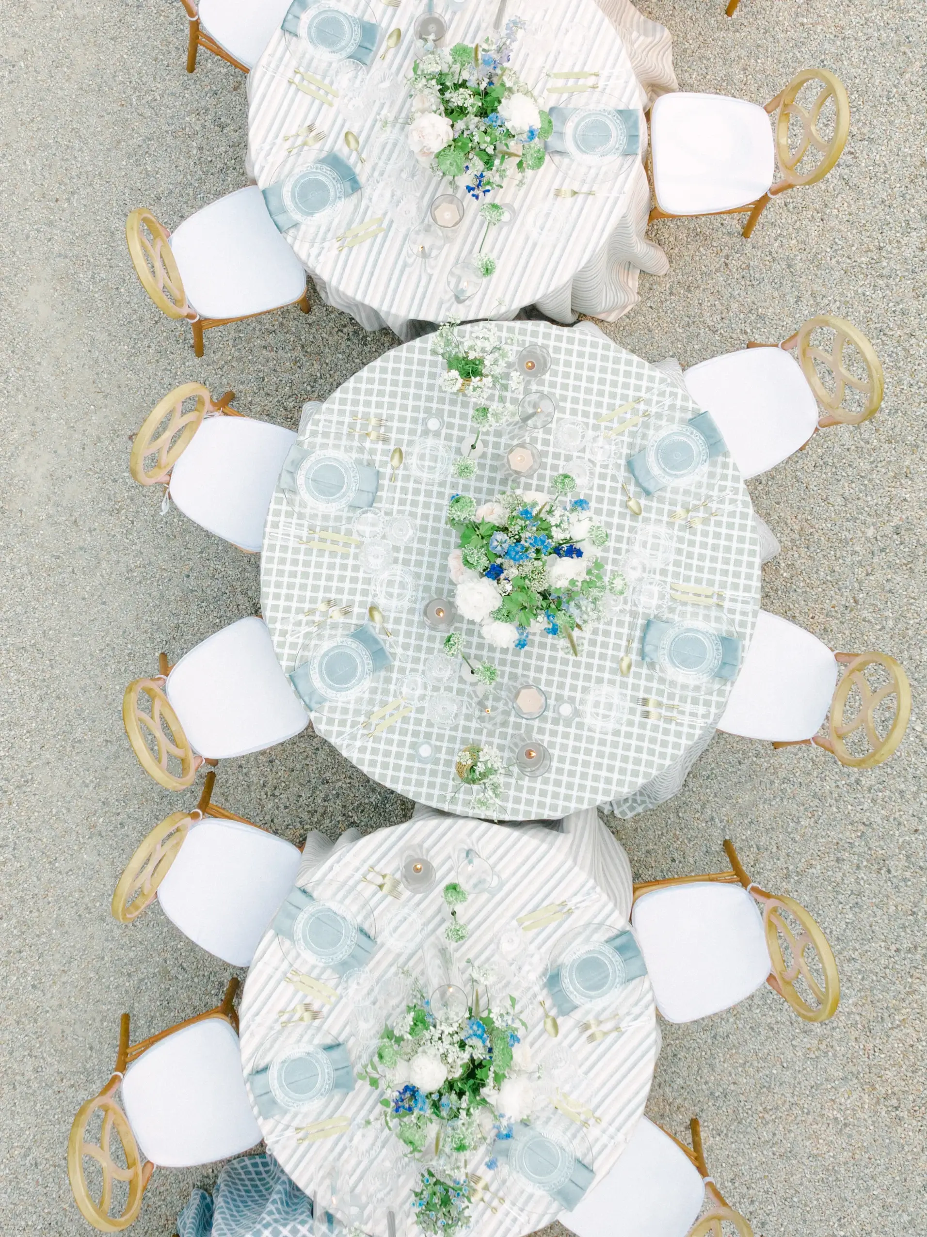 an overhead view of tables with mix and match table linen styles to create a unique event design