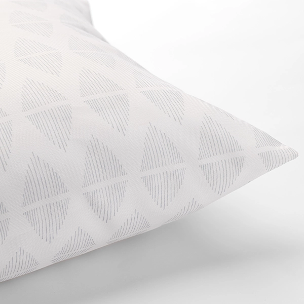 A Diem Grey Pillow with a pattern on it, available for table linen rental.