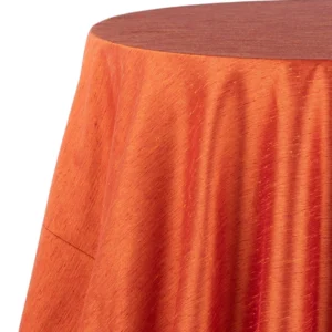 A view from the left on the Tussah Sunset Orange Red tablecloth rental