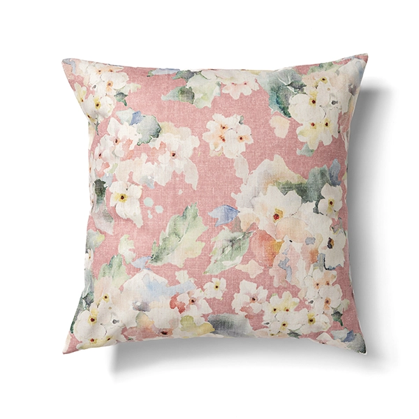 An Evelyn Rose Pillow linen rental with a floral pattern.