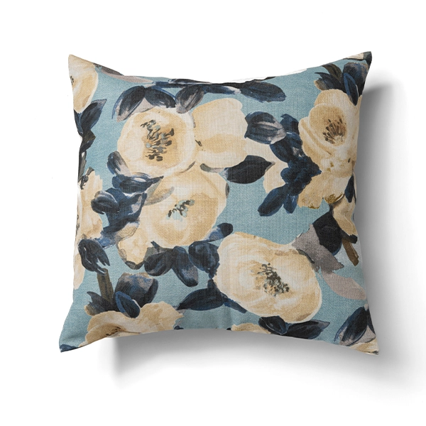 An Ophelia Sky Pillow with a floral pattern.