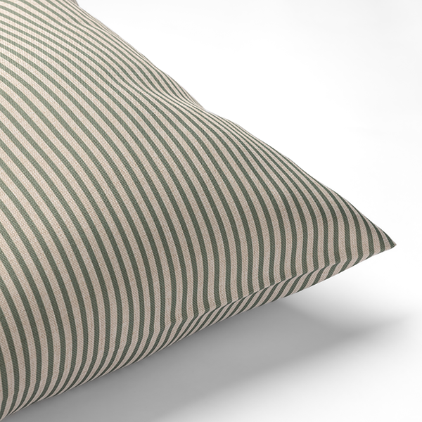 A close-up of a pillow with a green and white vertical stripe pattern on a white background.