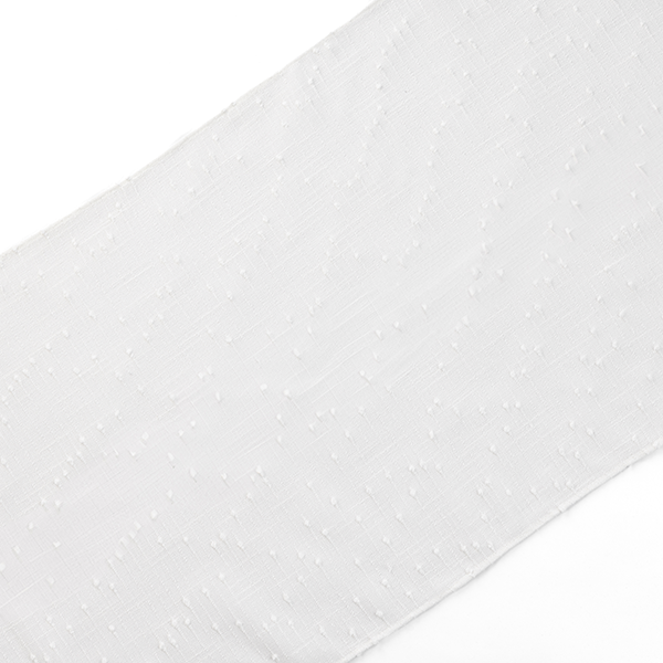 Close-up of a plain white fabric with a subtle, textured dot pattern. The fabric appears smooth and slightly sheer.