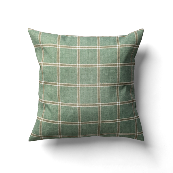 A green plaid square pillow against a white background.