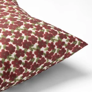 Percival Olive Pillow featuring a red and green floral pattern on a white background.