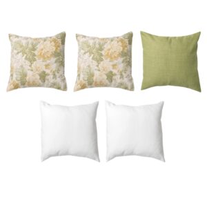 Five pillows are displayed: two with floral patterns, one solid green, and two plain white.