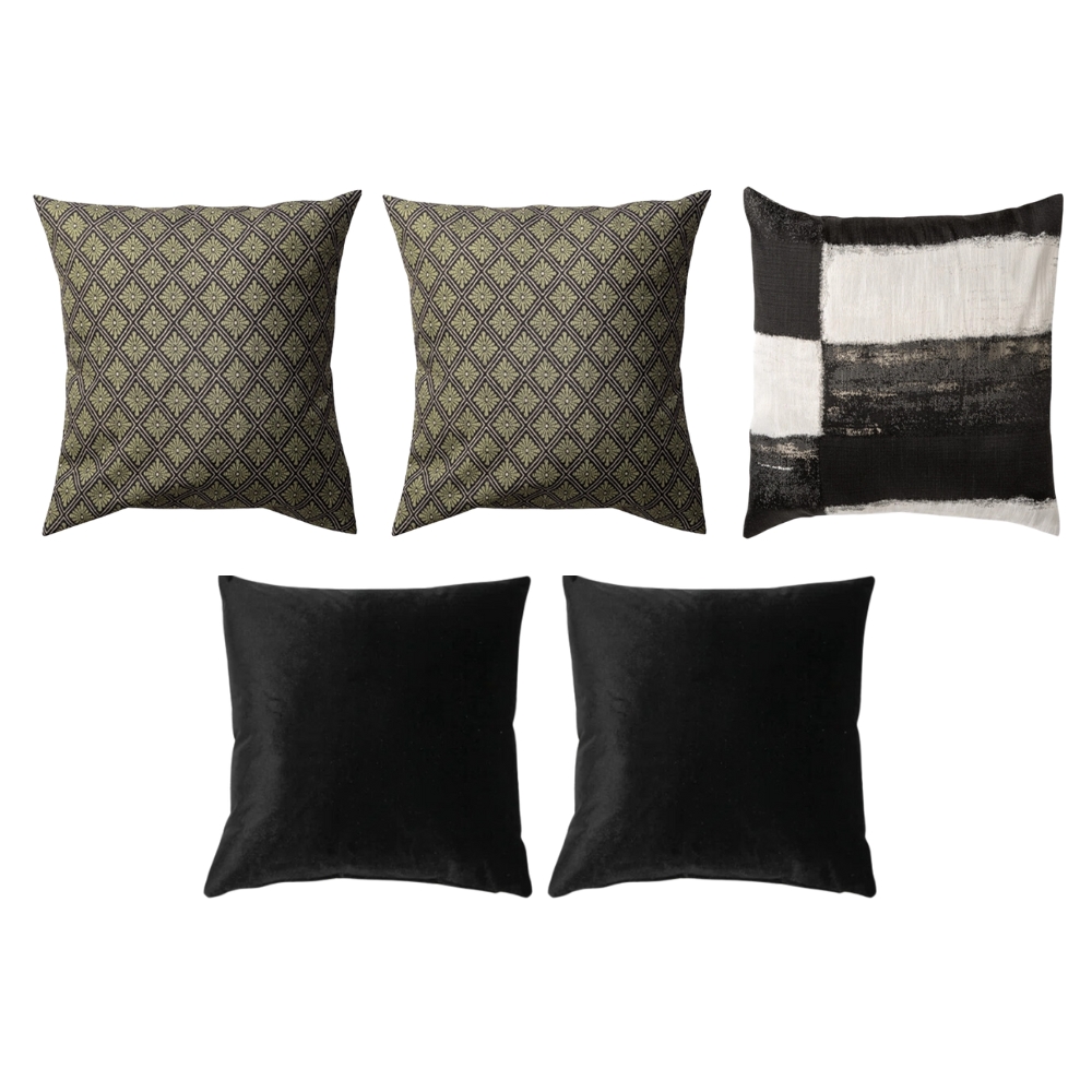 Five square throw pillows: three with geometric patterns (two green, one black and white), and two solid black.