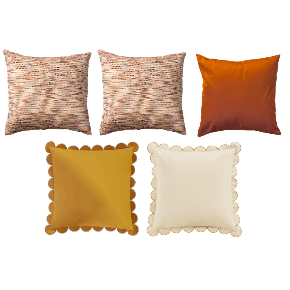 Five decorative pillows with varied designs: three multicolored, one solid orange, and one each in yellow and white with scalloped edges.