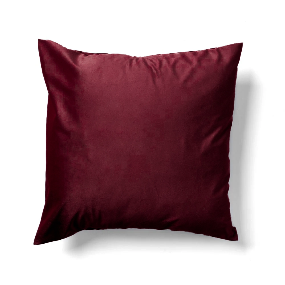 A square navy pillow with a smooth velvet texture against a white background.