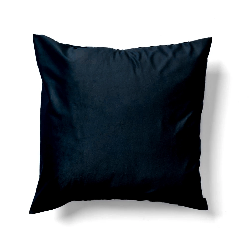 The Velvet Navy Pillow, featuring a square shape and smooth texture, is displayed against a white background.